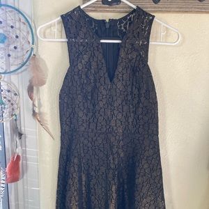 Black and gold lace dress